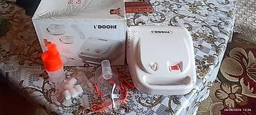 L’DOCILE inhalyator/nebulayzer cihazı. Komplektdə görünən hissələr: - — 2