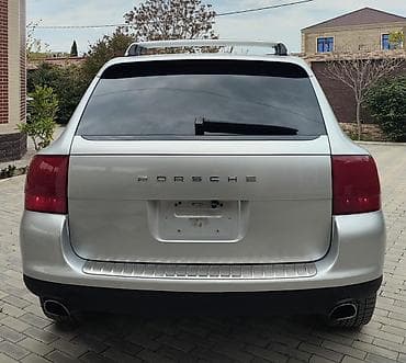 porsche disk: Porsche Cayenne (1-ci nəsil) – gümüşü rəngli SUV ili 2003 mator 4.5 — 4
