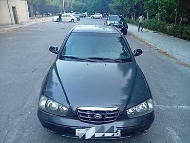 lider disk: Hyundai Elantra: 2 l | 2003 il Sedan — 1