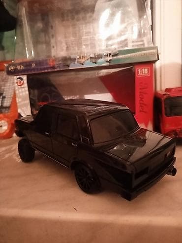 dinozavr oyuncaq: Salam 1 18 pultlu 07 qutu pult usdunde isleyir sadece qabag tekerler — 3