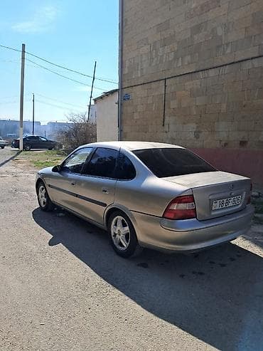 w210 yan guzguler: Opel Vectra: 2 l | 1996 il 27000 km Sedan — 6