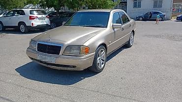 audi a6 c5: Mercedes-Benz C-Class: 2.2 l | 1994 il Sedan — 4