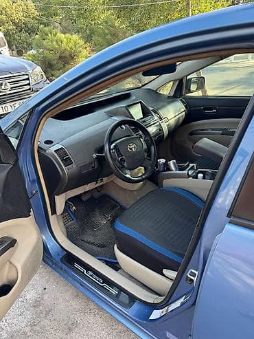 prius qanad: Toyota Prius (2-ci nəsil) – mavi rəng, hibrid hatchback — 10