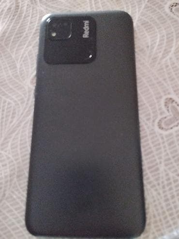 telfon sade: Xiaomi 32 GB, rəng - Qara, 
 İki sim kartlı — 1