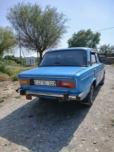 traktor te 25: VAZ 2106, mavi rəng, klassik sedan Xüsusiyyətlər: - Kuzov: 4 qapılı — 5