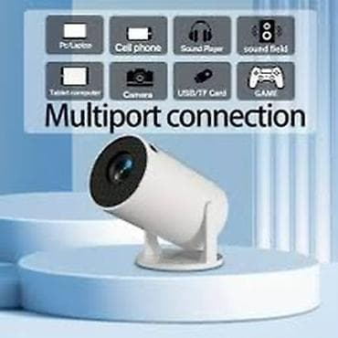 hd recorder: Mini proyektor, kompakt və müasir silindrik dizayna malikdir. Masa və — 2