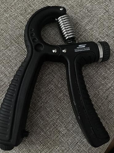 hand grip: Skechers Performance brendinin qara rəngli əl gücləndiricisi. Bu — 1