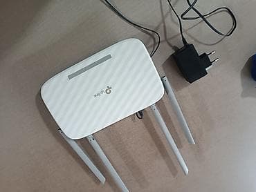ipad 2: TP-Link Archer C50 (AC1200) Dual Band Wi‑Fi router - Model: Archer — 1