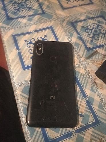 Xiaomi Mi6, 32 ГБ, цвет - Черный, 
 Отпечаток пальца — 1
