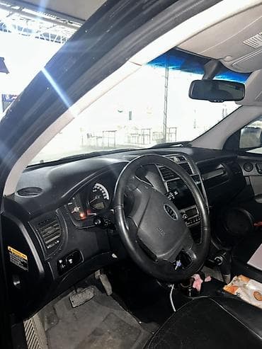 opel astra kompressor: Kia Sportage: 2 l | 2007 il Krossover — 8