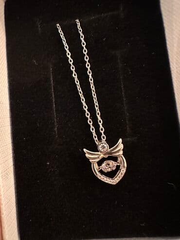 tək qaş: Boyunbağı — 1