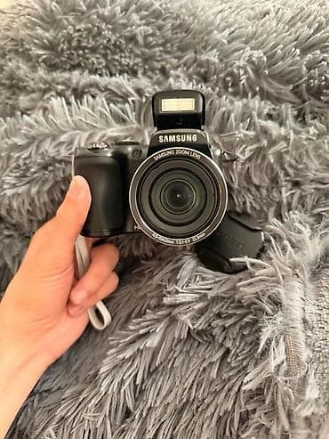iqlim paneli: Samsung rəqəmsal fotoaparat – bridge tip. Xüsusiyyətlər: - Samsung — 1