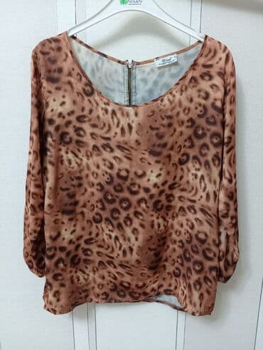 ağ qadın köynəyi: Vərəqləyin. Bluzka baha alınıb 2 dəfə geyilib.M-L uyğun 12 — 4