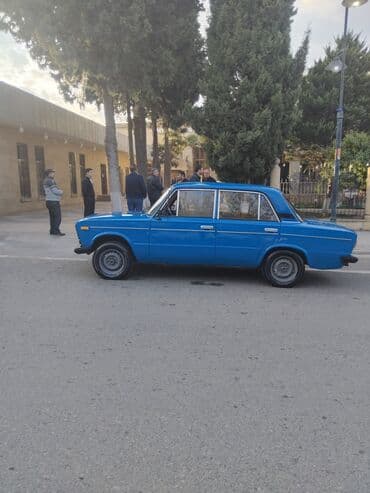 opel vectra b suret qutusu: VAZ 2106 sedan – mavi rəngdə, 4 qapı, klassik kuzov. Xüsusiyyətlər — 4