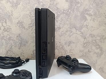 playstatio: PS4 Slim 500gb +2pult +2 disk +15 oyun yaddaşda. Cihaz əla vəziyətdə — 2