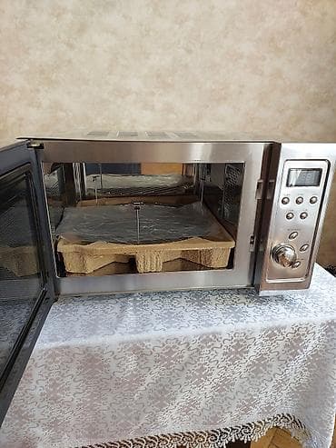 Mikrodalğalı soba Geepas, Ayrıca dayanan, Mikrodalğalar ilə, rəng - Gümüşü, Yeni