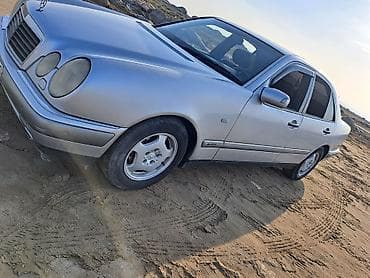 Mercedes-Benz E-Class W210 sedan, gümüş rəng. işləri var. zəng çatmasa