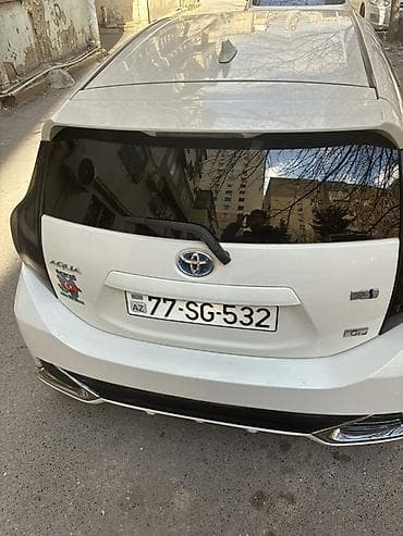 belarus 1221 satisi: Toyota Aqua hibrid hetçbek Maşın bakıdadı real alıcıya cuzi endirim — 9