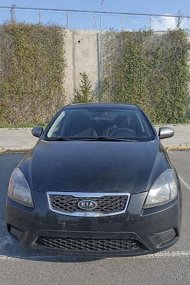 Kia Rio: 1.5 l | 2010 il Hetçbek
