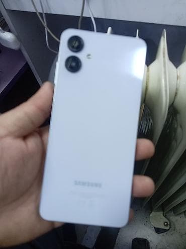 telefonlar s 32: Samsung Galaxy A06, 128 GB, rəng - Gümüşü, Sənədlərlə — 3