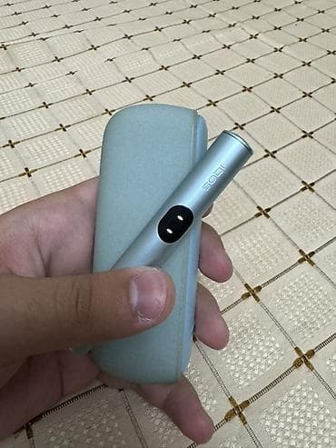IQOS isti-tütün cihazı və şarj qabı - Model: IQOS (stick və portativ