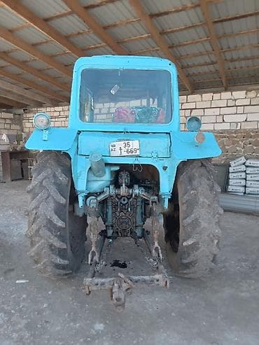 215 r13 teker: Traktor MTZ 50/52 tipli (mavi rəngdə), kabinəli. Texniki xüsusiyyət — 3