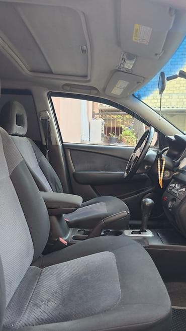 barter disk: Mitsubishi Outlander – boz rəngli, universallığı və rahatlığı ilə — 1