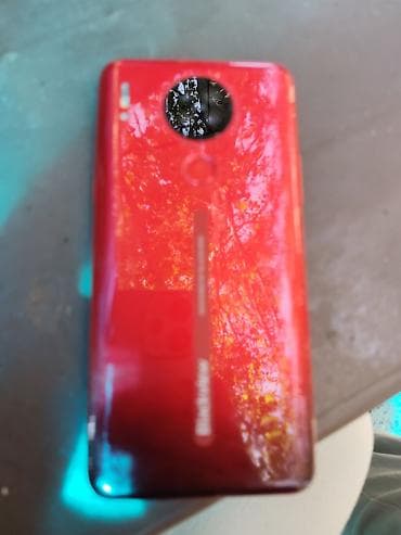 Məhsul: Qırmızı rəngli smartfon Xüsusiyyətlər: - Arxa hissədə dairəvi