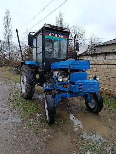 lapet qoşqu: Mavi rəngli tək kabinəli təkərli traktor. Texniki xüsusiyyətlər və — 3