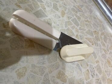 Qurutma üçün altıqlar: Konserv qapagi acmaq ucundu - Material: paslanmayan metal bıçaq/press — 1