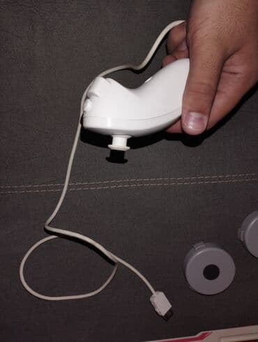 nintendo wii: Wii fit Nintendo original. Əla veziyyetdedir, coystik tutucusu ve — 14