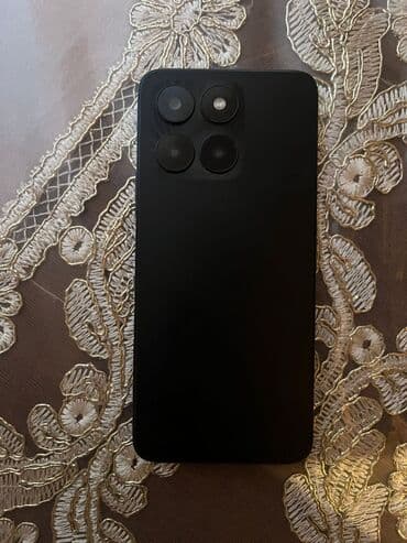 telefon redmi not 9: Qara rəngdə smartfon - Korpus: mat qara arxa panel, küncləri yumrudur — 2