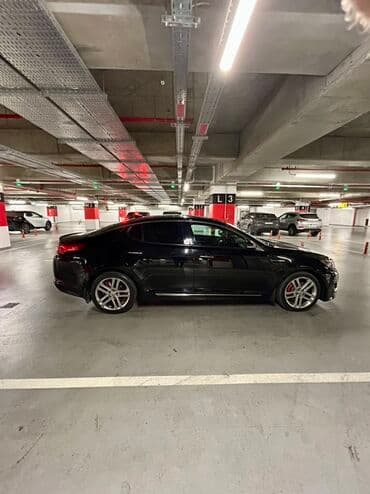 xrom diski: Kia Optima – qara rəng, sedan kuzov. Şəhərdaxili və magistral yollarda — 5