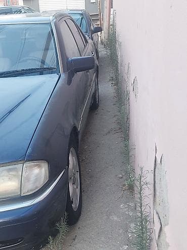 Mercedes-Benz C-Sinif sedan (W202), tünd mavi rəng. - Kuzov: 4 qapılı — 4
