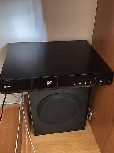 musiqi merkezi: LG Ev Teatri sistemi Komplekt: - 4 ədəd hündür səsgücləndirici - 1 — 3