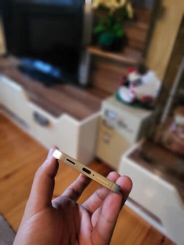 tikanlı tel: Samsung Galaxy S24, 128 GB, rəng - Bej, Simsiz şarj — 4