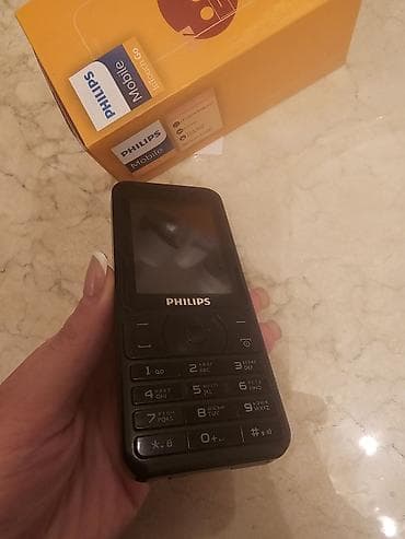 nokia 2720 fold: Philips düyməli mobil telefon. (poverbank kimide istifade oluna — 2