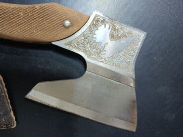 qazma baltası: İşlənmiş Ovçu baltası, Paslanmaz polad, Ünvandan götürmə — 4