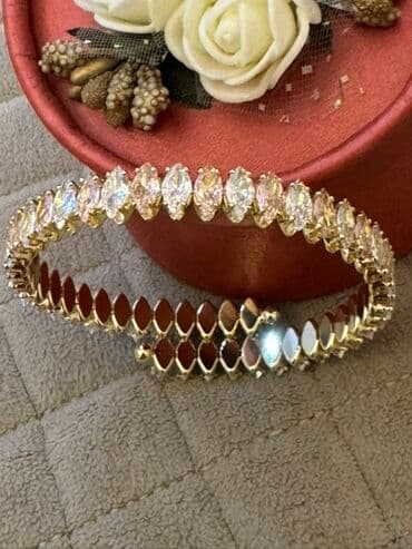 Zərif qadın bilərziyi – qızılı tonlu metal üzərində marquise kəsimli lalafo.az -da Zərif qadın bilərziyi – qızılı tonlu metal üzərində marquise kəsimli