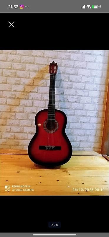 Gitar ideal vəziyyətdədir uzerinde canta verilir — 7