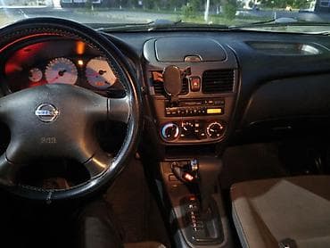 brabus disk: Nissan Sunny: 1.3 l | 2008 il Sedan — 1
