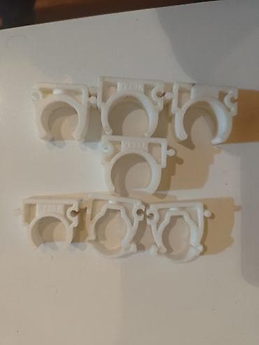 Plastik boru bərkidiciləri – xamut - Material: ağ rəngli möhkəm