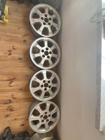 R15 Opel astra diskleri.Yaxsi veziyyetdedir.1 də suvarka var.Problem