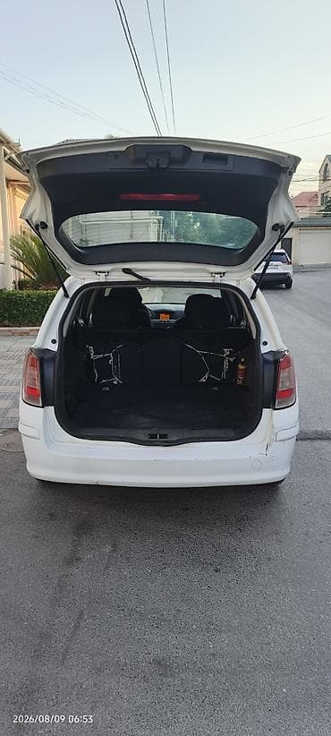 tek oturacaqlar: Opel Astra: 1.3 l | 2010 il 360000 km Universal — 4