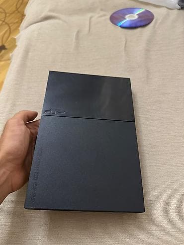 ps1 disk: PlayStation 2 Slim oyun konsolu. Kompakt və nazik korpusa malik PS2 — 2