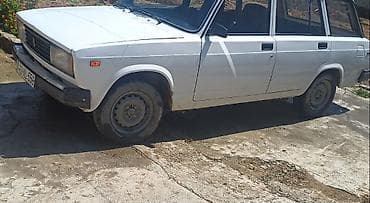 masin lada: Lada (VAZ) 2104 universal, ağ rəng. - Kuzov: 5 qapılı universal, damda — 2