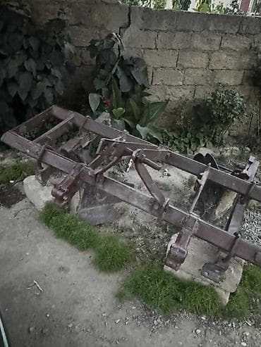 toy guzgusu: Məhsul: Təkərli kənd təsərrüfatı traktoru və asqılı kotan — 9