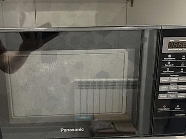 il: Mikrodalğalı soba Panasonic, Mikrodalğalar ilə, rəng - Qara, İşlənmiş — 1