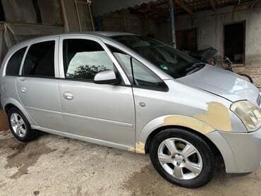опель зафира а: Opel Meriva, gümüşü rəng, 5 yerlik kompakt MPV. Xarici: - Gümüş — 16