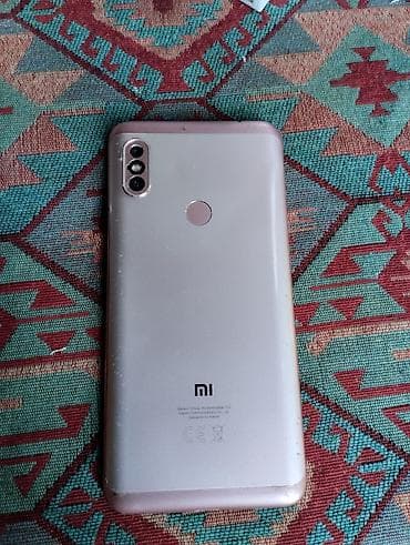 philips xenium 9@9z: Redmi Note 6Pro üz şüşə az çat var 64gb — 2